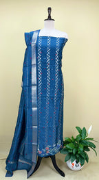 Teal Blue Maheshwari Silk Featuring Intricate Floral Embroidery and Silver Zigzag Thread Work Unstitched Suit