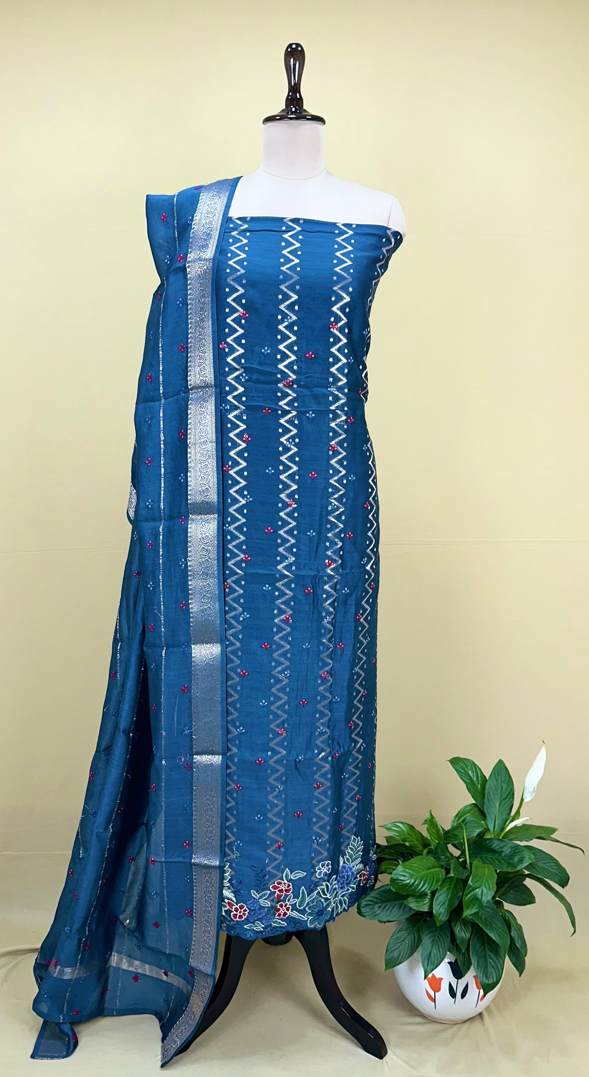 Teal Blue Maheshwari Silk Featuring Intricate Floral Embroidery and Silver Zigzag Thread Work Unstitched Suit