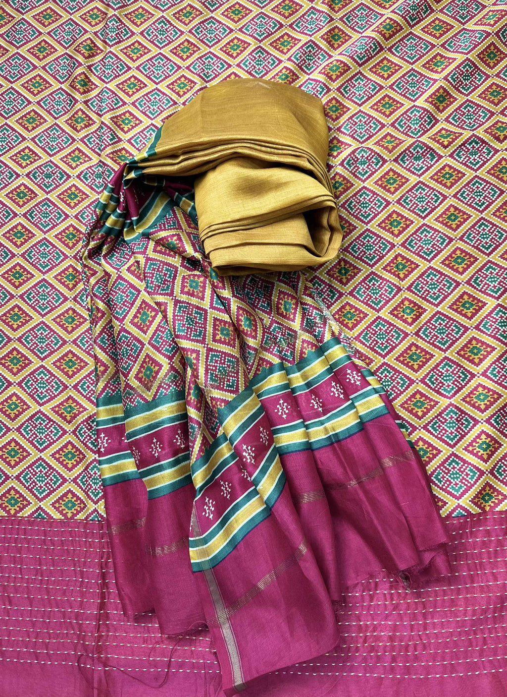 Mustard with Red Patola Print with Kanta Work Border Unstitched Suit