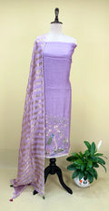 Purple Mal Chanderi Features Intricate Embroidery Depicting a Peacock and Floral Motifs, Characteristic of a Premium Indian Unstitched Suit