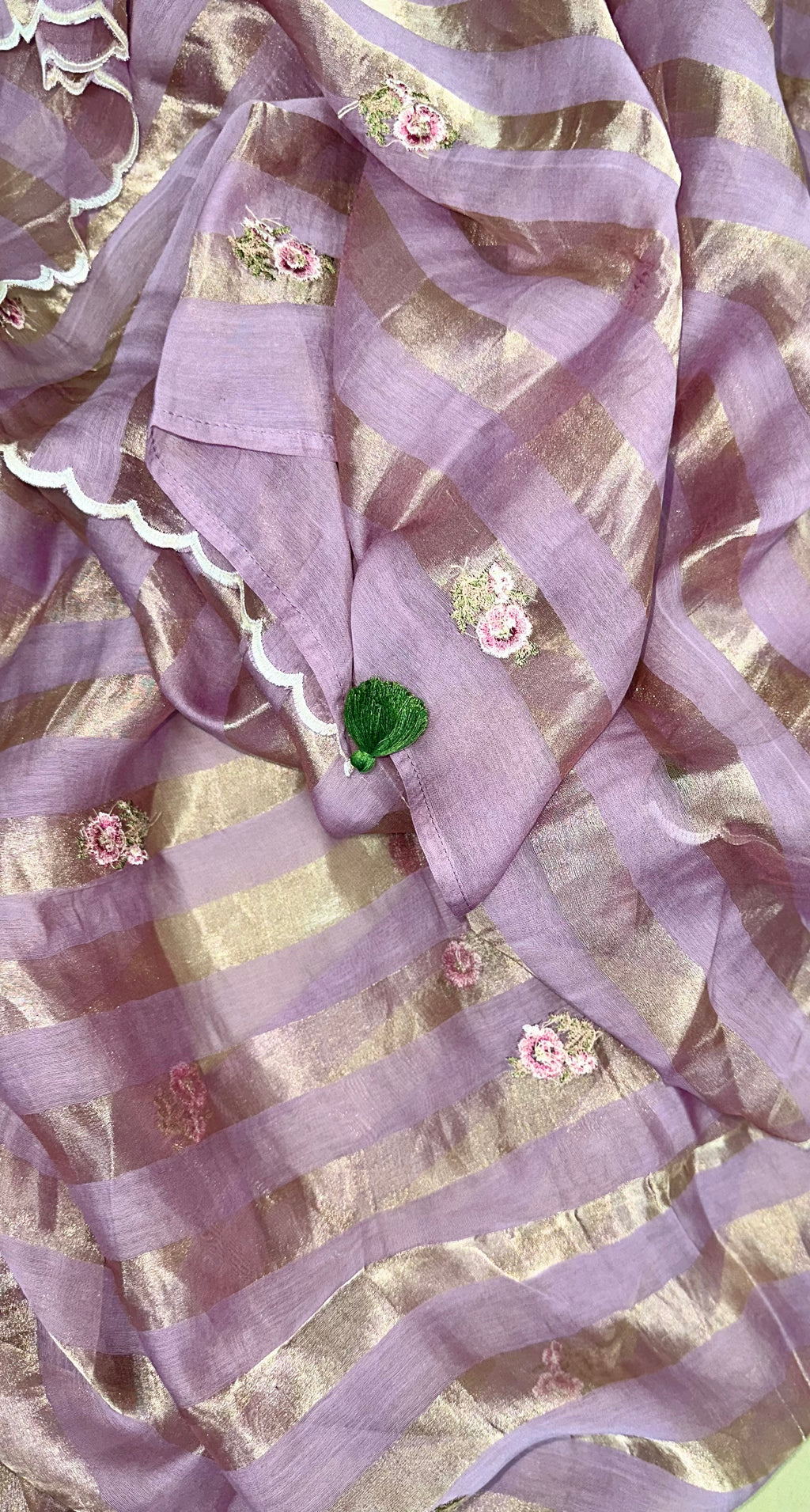 Purple Mal Chanderi Features Intricate Embroidery Depicting a Peacock and Floral Motifs, Characteristic of a Premium Indian Unstitched Suit