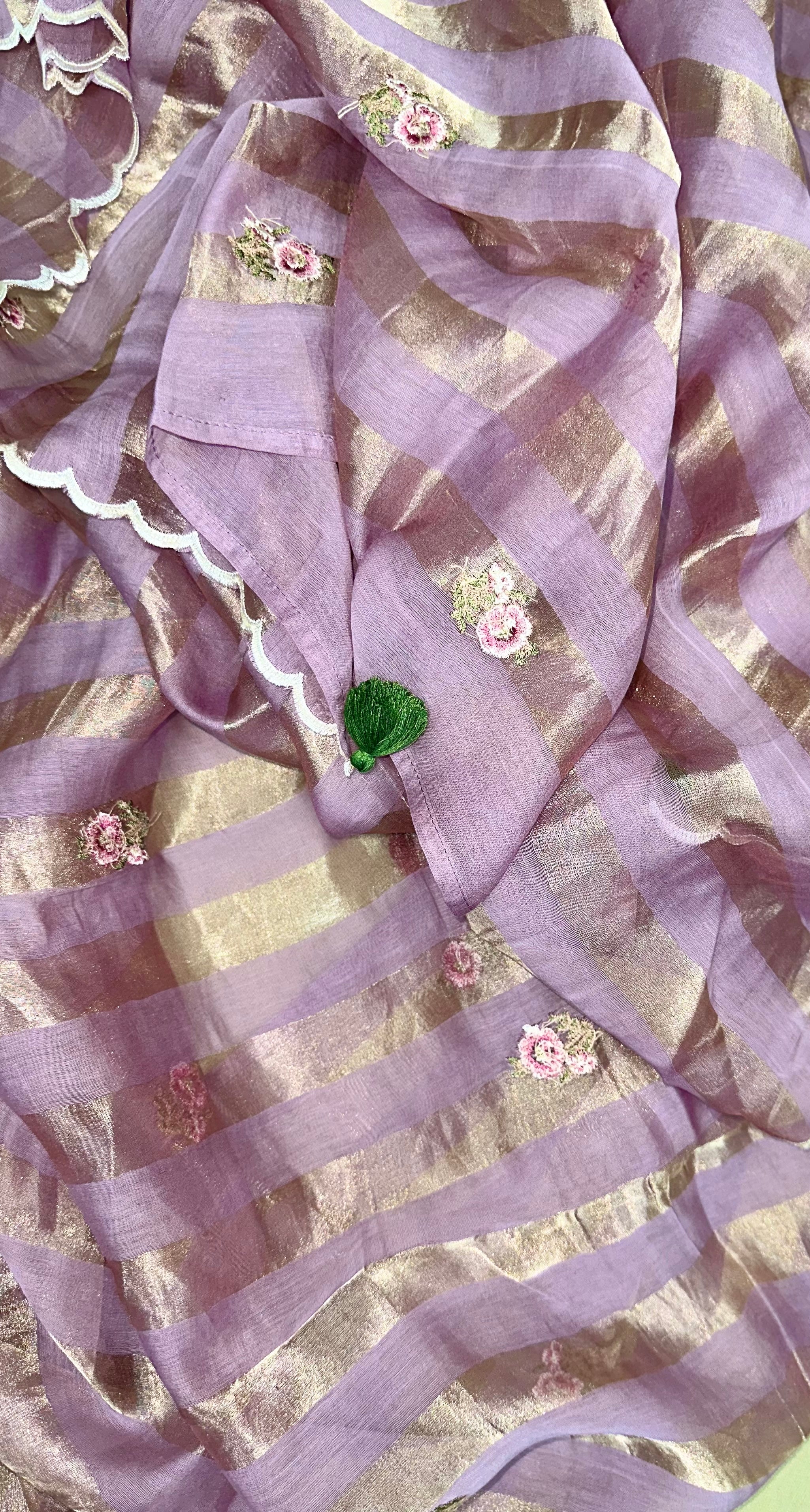 Purple Mal Chanderi Features Intricate Embroidery Depicting a Peacock and Floral Motifs, Characteristic of a Premium Indian Unstitched Suit