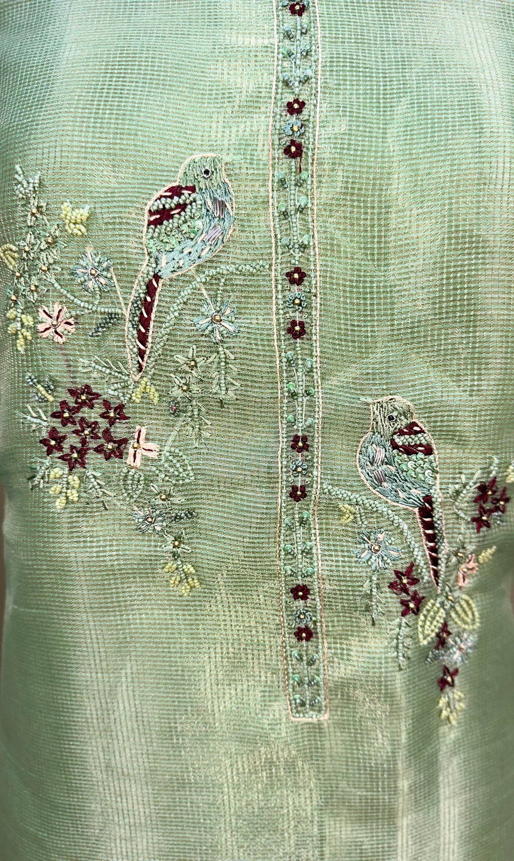 Green Kora Adorned with Intricate Embroidered Motifs Including a Bird and Floral Patterns, Commonly Crafted Using Techniques Like Zardosi and Kantha Work Unstitched Suit