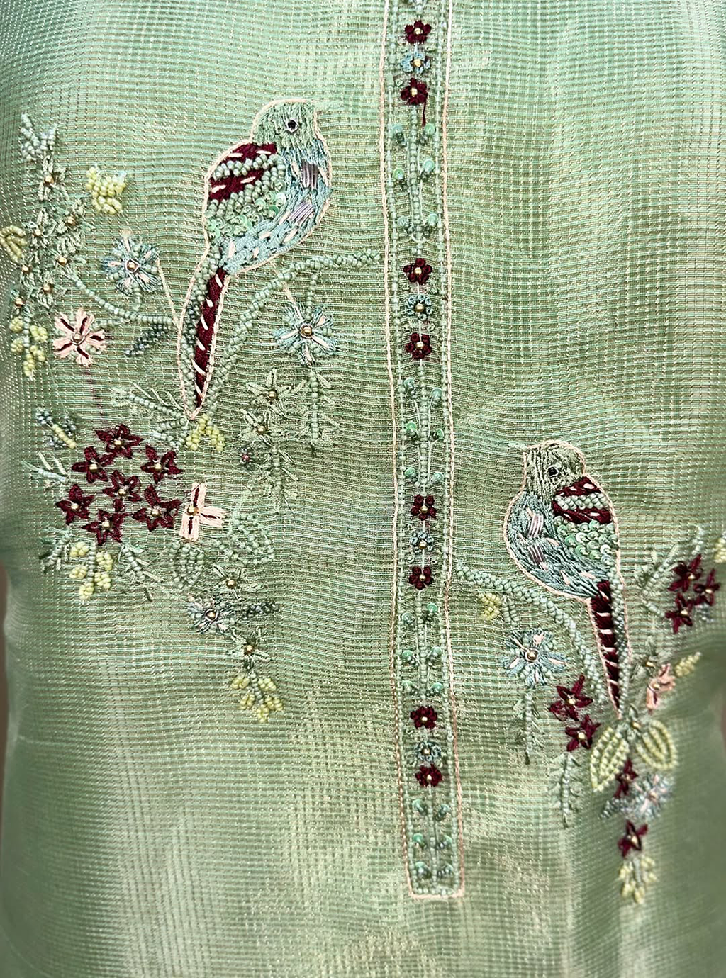 Green Kora Adorned with Intricate Embroidered Motifs Including a Bird and Floral Patterns, Commonly Crafted Using Techniques Like Zardosi and Kantha Work Unstitched Suit