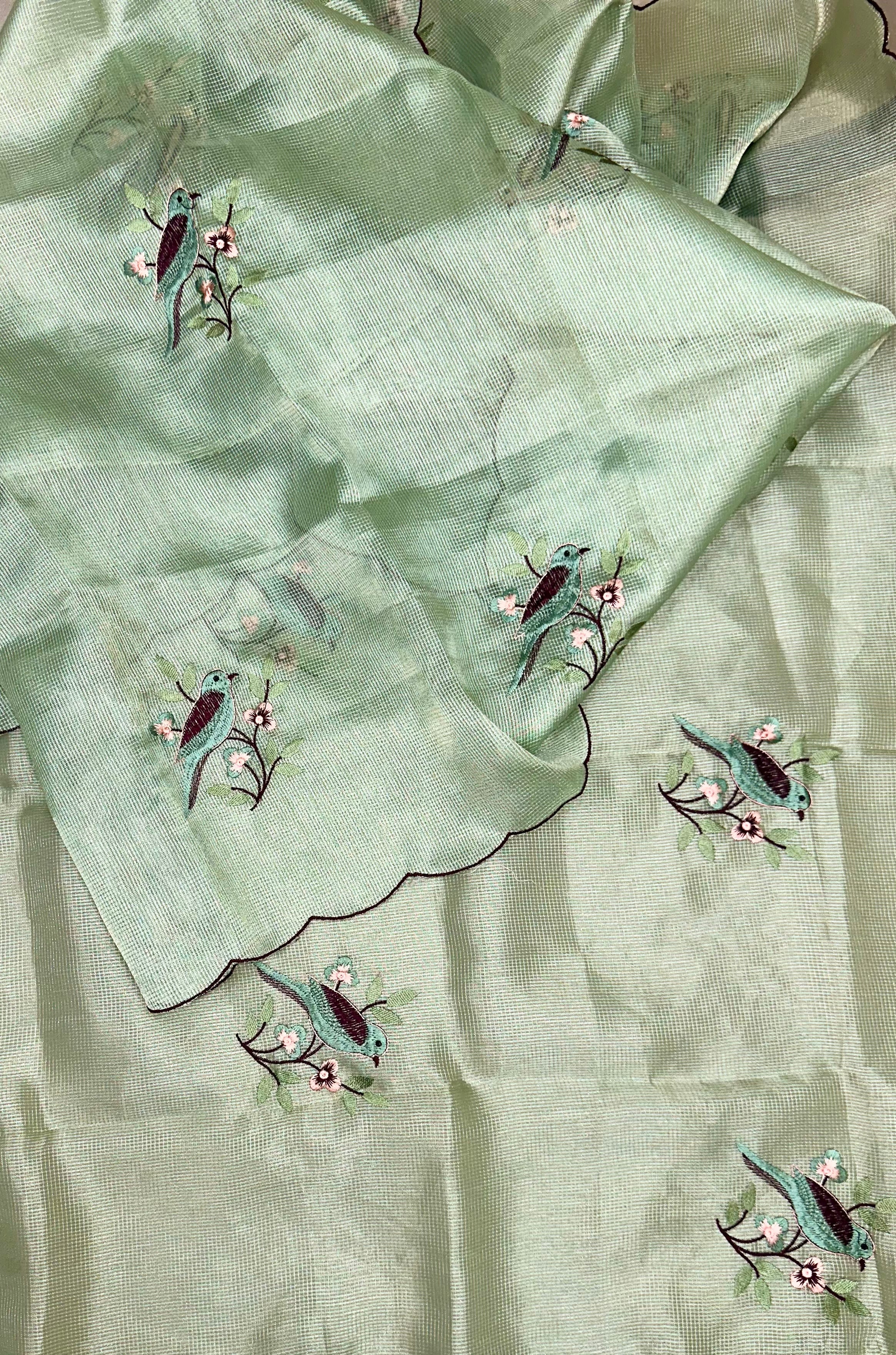 Green Kora Adorned with Intricate Embroidered Motifs Including a Bird and Floral Patterns, Commonly Crafted Using Techniques Like Zardosi and Kantha Work Unstitched Suit