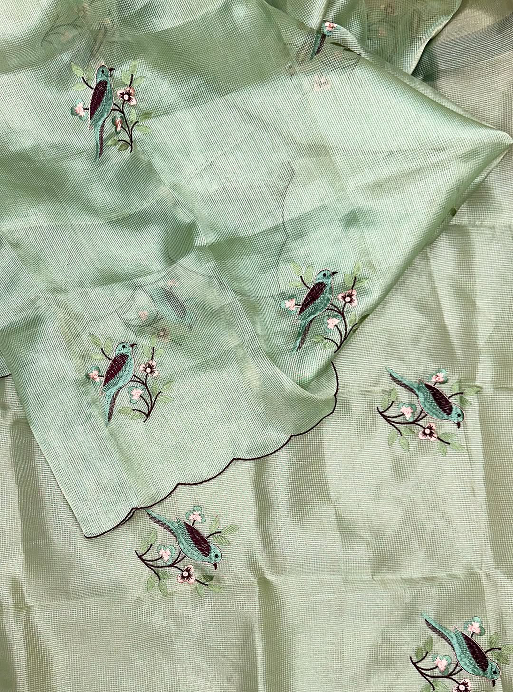 Green Kora Adorned with Intricate Embroidered Motifs Including a Bird and Floral Patterns, Commonly Crafted Using Techniques Like Zardosi and Kantha Work Unstitched Suit