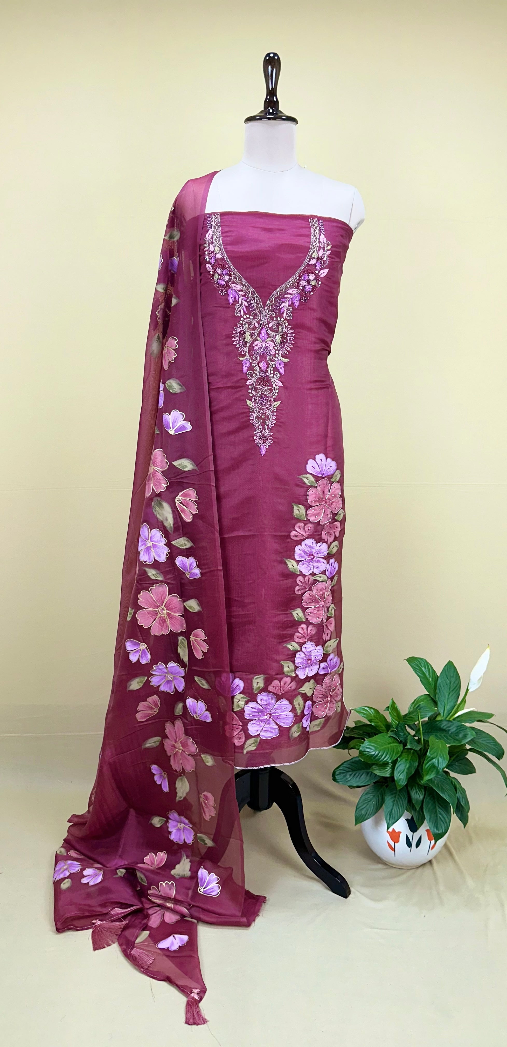 Wine Organza Featuring Elegant Hand-Painted Floral Designs Combined with Hand Embroidery Detailing Unstitched Suit