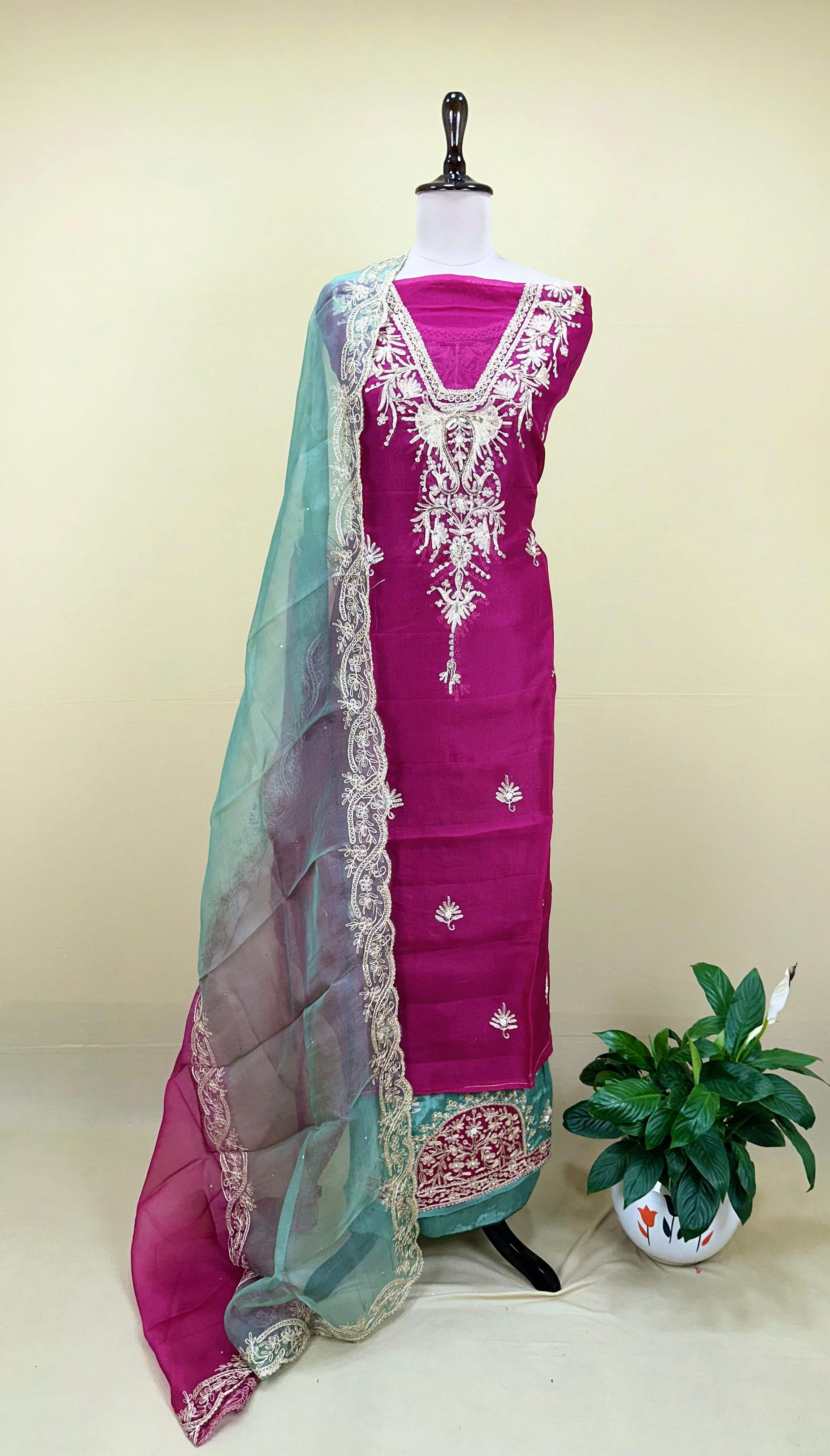 Magenta Pure Organza Featuring Heavy Front And Back Gold Zari Embroidery Unstitched Suit