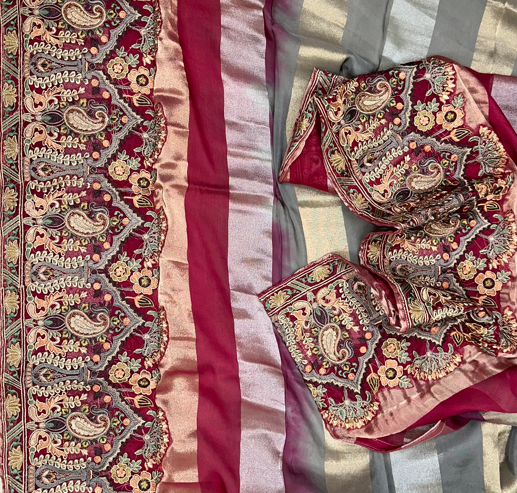 Maroon Pure Organza Intricate Paisley Motifs and Rich, Multi-Colored Hand Embroidery, Often Referred to as Sozni or Kalamkari with Light Hand Work Unstitched Suit