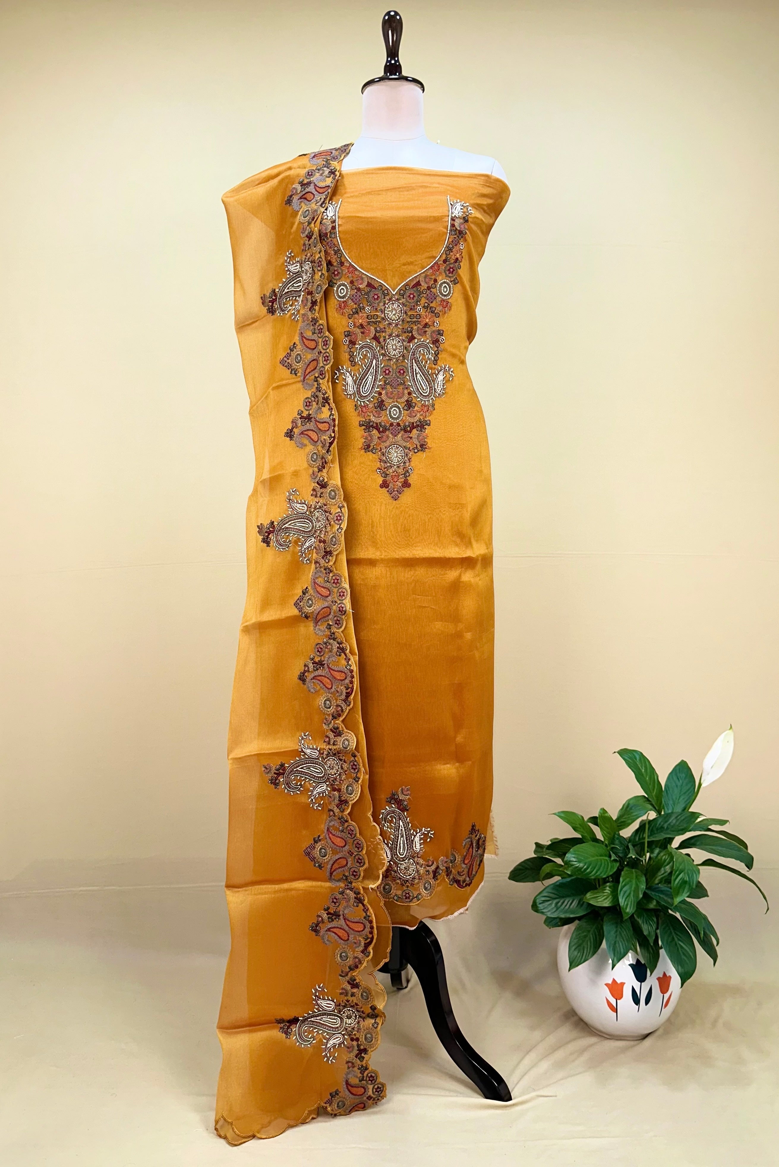 Mustard Pure Organza with Featuring Intricate Traditional Embroidery Unstitched Suit